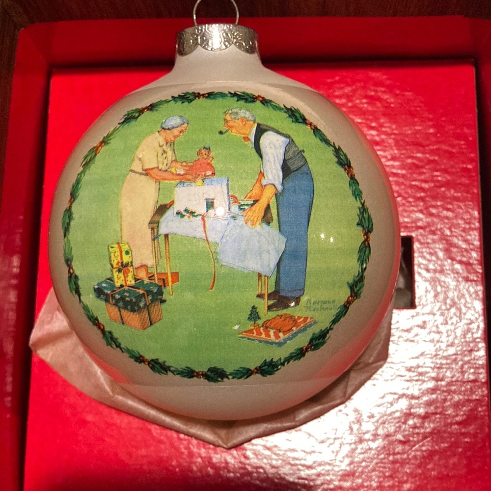 Vintage rare find Norman Rockwell 1979 Wrapping Christmas Presents ornament.